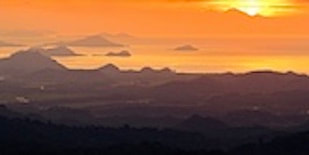 Photo of a sunset overlooking Labuan Bajo Indonesia